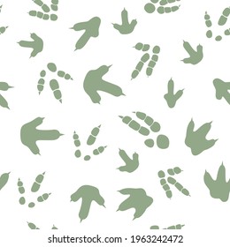 Dinosaur footprint tracks. Minimal color seamless pattern. Background with paw, claw predator. Dinosaur footprint seamless pattern perfect for textile, wrap and wallpaper and design