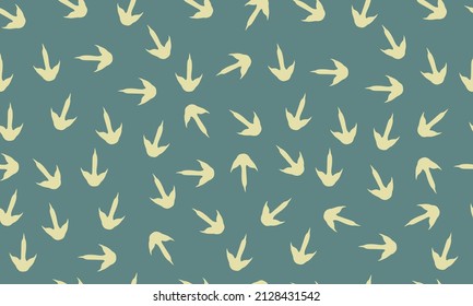 Dinosaur footprints horizontal seamless pattern. Green vector background with dinosaur paw prints. Simple texture of prehistoric dino predator. Design for children's textiles, packaging, fabric.