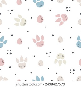 Dinosaur footprints seamless pattern. Polka dot childish vector illustration with dinosaur paws. Vector illustration. Kids collection