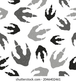 Dinosaur footprints seamless pattern. Vector black and white doodle illustration