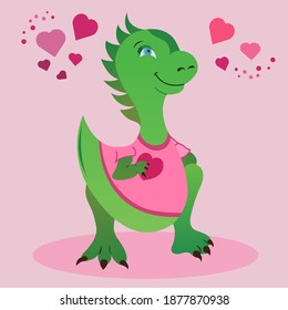 Dinosaur in love. Cute dinosaur in a pink T-shirt with a valentine heart in his paw. Cute dinosaur on a pink background, around the hearts. Celebrating Valentine's Day