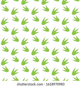 Dinosaur seamless pattern Dino traces background Dinosaur print Green color fabric design wallpaper vector