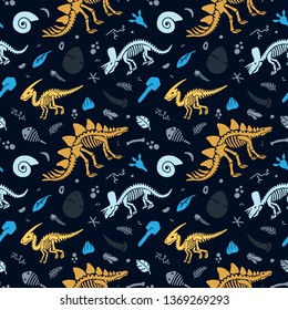 Dinosaur skeleton and fossils. Vector seamless pattern. Original design with dinosaur bones, stones, traces, plants and eggs. Print for T-shirts, textiles, web.Black background.