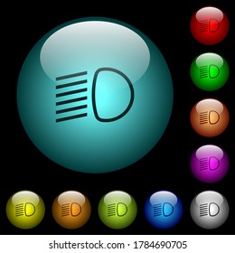 Dipped beam lights icons in color illuminated spherical glass buttons on black background. Can be used to black or dark templates
