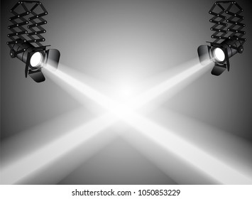 Directed light spotlights on stage gray background.