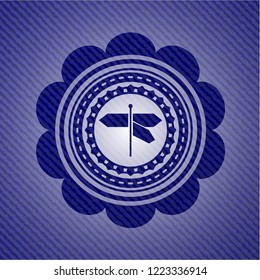 directions sign icon with denim texture