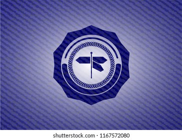 directions sign icon inside badge with denim texture