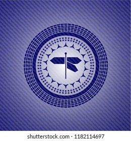 directions sign icon inside emblem with denim texture