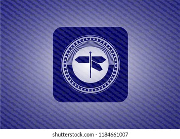 directions sign icon inside emblem with jean background