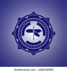 directions sign icon inside emblem with jean background