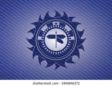 directions sign icon inside emblem with denim high quality background