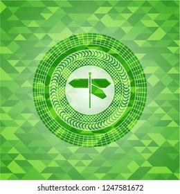 directions sign icon inside green emblem with mosaic ecological style background