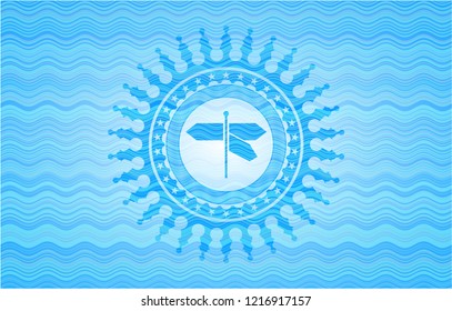 directions sign icon inside light blue water wave badge.