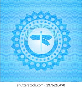 directions sign icon inside light blue water wave badge.
