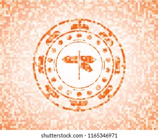 directions sign icon inside orange mosaic emblem