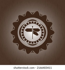 Wegweiser Symbol im Retro-Holzemblem. 