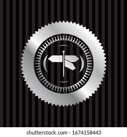 directions sign icon inside silver badge or emblem