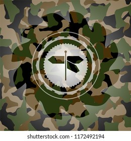 directions sign icon on camo texture
