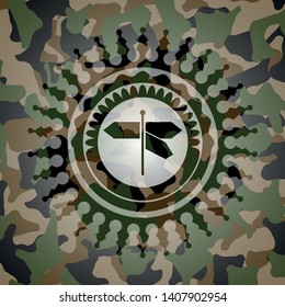 directions sign icon on camouflaged pattern