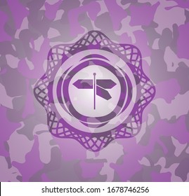 directions sign icon on pink camo pattern