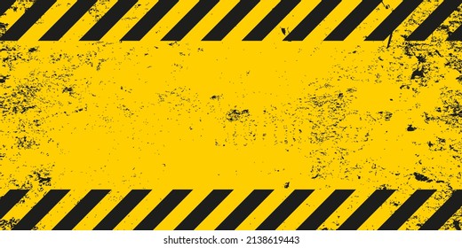 Dirty old grunge black and yellow warning striped line background template. Construction safety sign banner