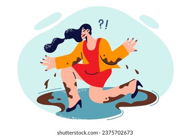 Dirty woman fallen into puddle during rain and unfavorable weather conditions is waiting for help. Girl got clothes dirty and was injured while fall caused by strong winds or slippery ground.