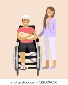 A disabled man sitting in a wheelchair next to his wife and holding a baby