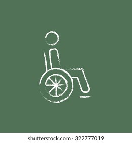 Disabled person hand drawn in chalk on a blackboard vector white icon isolated on a green background.