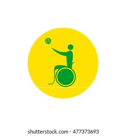 A disabled person in a wheelchair playing handball