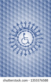 disabled (wheelchair) icon inside blue badge with geometric pattern.