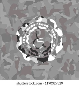 disabled (wheelchair) icon inside grey camouflage emblem