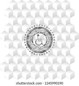 disabled (wheelchair) icon inside grey badge with geometric cube white background