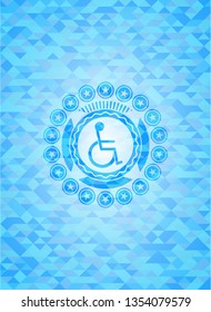 disabled (wheelchair) icon inside light blue mosaic emblem