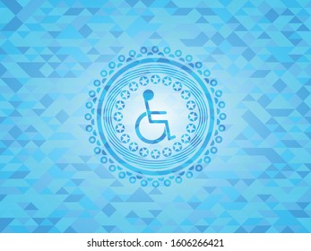 disabled (wheelchair) icon inside light blue mosaic emblem