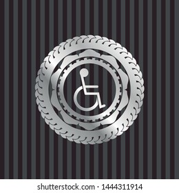 disabled (wheelchair) icon inside silver emblem or badge