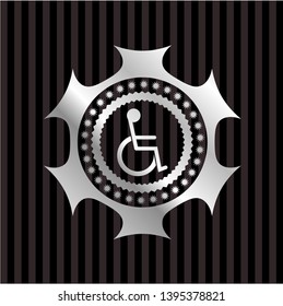 disabled (wheelchair) icon inside silvery emblem or badge
