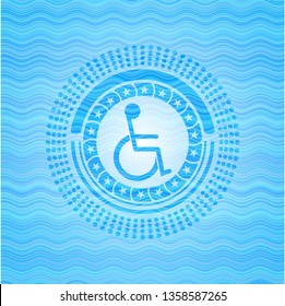 disabled (wheelchair) icon inside sky blue water style badge.
