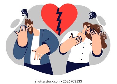 Disagreements in family among upset couple standing near broken heart, after quarrel or finding out fact of betrayal. Conflict in dysfunctional family wishing to dissolve marriage and end cohabitation