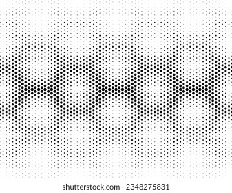 Disappearing seamless halftone vector background. Filled with black hexagones