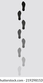 Disappearing traces of footprints of shoes isolated on white background.