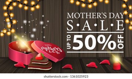 Discount banner for women's day with garland, candle, petal, gift in the shape of a heart and candy