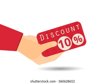 Discount coupons in hand. 10 percent discount. Special offer. Gift boxes in the background.