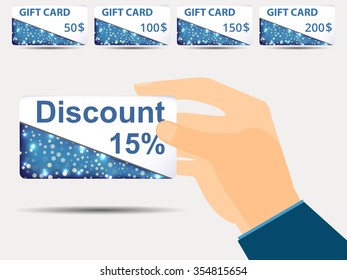 Discount coupons in hand. 15-percent discount. Special offer. Set gift card.