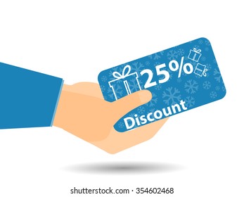 Discount coupons in hand. 25-percent discount. Special offer. Snowflakes and gift boxes.