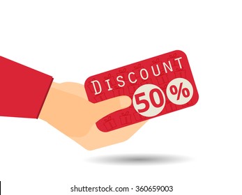 Discount coupons in hand. 50 percent discount. Special offer. Gift boxes in the background.