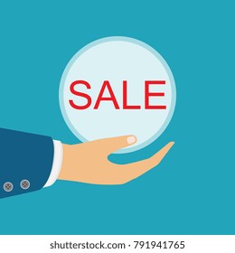 Discount and shopping concept. Vector. Hand holding a sale badge.