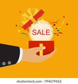 Discount and shopping concept. Vector. Hand holding a sale badge.
