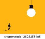 Discover knowledge. Businessman walks to the light bulb of wisdom