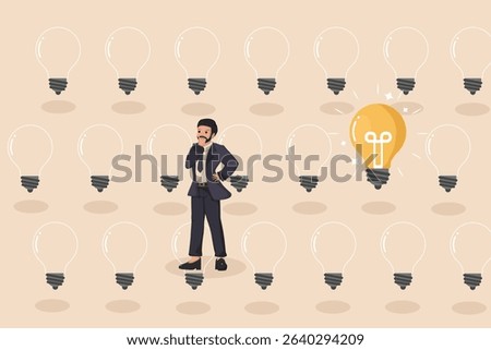 Discovering the Bright Idea: A Thoughtful Businessman Standing Among Many Dim Lightbulbs, with One Glowing Brilliantly, Symbolizing Finding the Right Solution and Innovation.