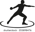 Discus thrower standing in the circle